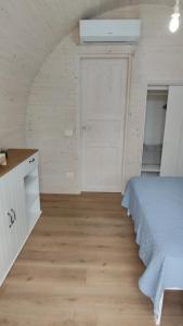 Postel nebo postele na pokoji v ubytování Camping Luni