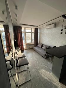 Зона вітальні в Arcadia apartment & sea terrace