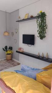Ένα ή περισσότερα κρεβάτια σε δωμάτιο στο Casa de hospedagem +4 φωτογραφίες