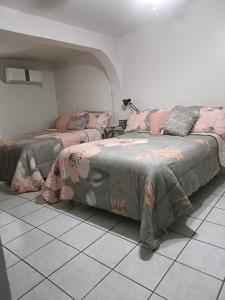 Postel nebo postele na pokoji v ubytování la casa de la tia Lucita
