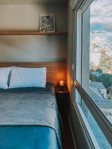 Katil atau katil-katil dalam bilik di Quintal Moinhos by LikeHome