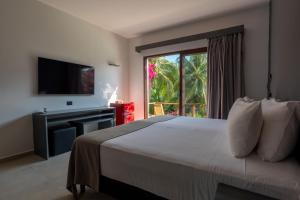 Postel nebo postele na pokoji v ubytování My Blue Hotel Holbox