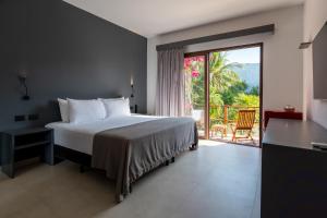 Postel nebo postele na pokoji v ubytování My Blue Hotel Holbox + 37 fotografií