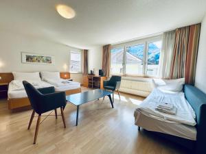 Posezení v ubytování Hotel Rebstock Meiringen