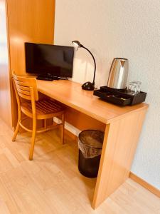 Kuchyň nebo kuchyňský kout v ubytování Hotel Rebstock Meiringen