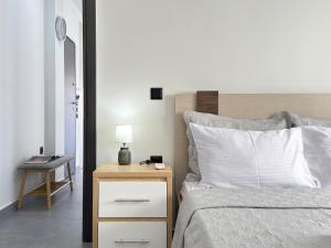 Ένα ή περισσότερα κρεβάτια σε δωμάτιο στο Kilada Luxury Apartment 2