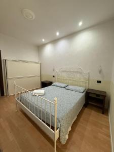 Posteľ alebo postele v izbe v ubytovaní Memole Inn Sanremo