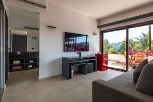 TV a/nebo společenská místnost v ubytování My Blue Hotel Holbox