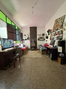 TV a/nebo společenská místnost v ubytování Meta! House mi casa es tu casa