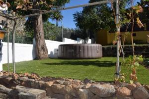 Vonkajšia záhrada v ubytovaní Villa Flores y Sol