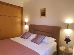 Posteľ alebo postele v izbe v ubytovaní Apartment D&D