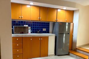 A kitchen or kitchenette at Spacious, standard with beach access & wifi!