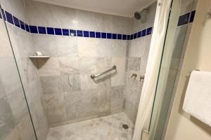A bathroom at Spacious, standard with beach access & wifi!