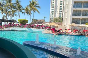 The swimming pool at or close to Spacious, standard with beach access & wifi!