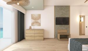 ein Schlafzimmer mit einem Bett und einem Fernseher an der Wand in der Unterkunft Riu Ventura - All Inclusive in Cancún