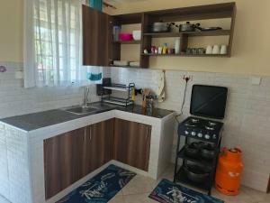Η κουζίνα ή μικρή κουζίνα στο Rawin homes +19 φωτογραφίες