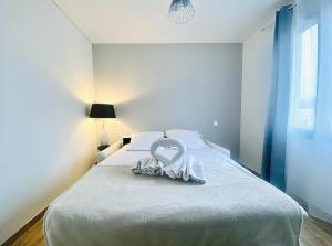 Postel nebo postele na pokoji v ubytování Villa Classée 3 étoiles familiale calme et nature + 37 fotografií