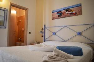 Voodi või voodid majutusasutuse Hotel Mar & Sol toas