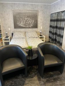 Ένα ή περισσότερα κρεβάτια σε δωμάτιο στο Viktera Modernes Apartment mitten in der Stadt und doch sehr ruhig Zu Therme 2 Minuten