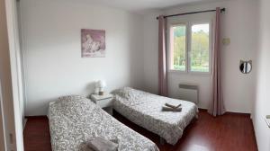 Photo de la galerie de l'établissement Maison proche plage avec jacuzzi, à Ondres