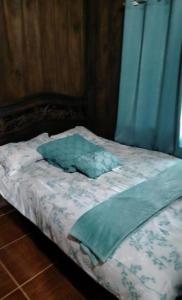 Postel nebo postele na pokoji v ubytování Hermosa Cabaña en Chachagua