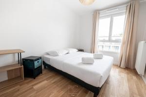 Ένα ή περισσότερα κρεβάτια σε δωμάτιο στο Disneyland-Paris, 6 pers, Parking, Wifi +12 φωτογραφίες