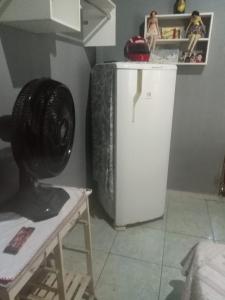 Kuchyň nebo kuchyňský kout v ubytování Quarto de Hóspedes da Menina Maricotinha