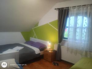 Postel nebo postele na pokoji v ubytování Hostel Lega House
