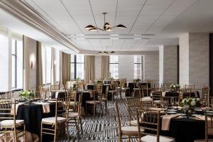 a banquet hall with tables and chairs in a room at Kimpton Hotel Monaco Baltimore Inner Harbor by IHG in Baltimore +79 photos