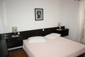 Posteľ alebo postele v izbe v ubytovaní Guest House Violeta