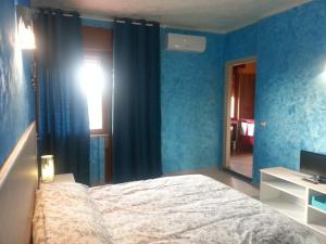 Letto o letti in una camera di Fenix