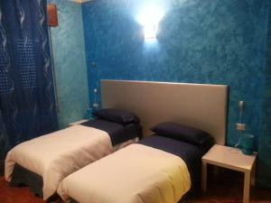 Letto o letti in una camera di Fenix