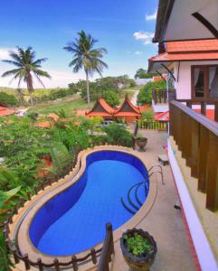 Bazén v ubytování Paradise Island Estate nebo v jeho okolí