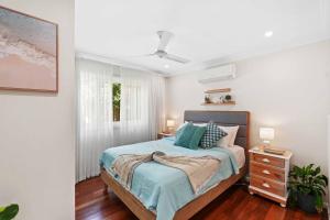 Postel nebo postele na pokoji v ubytování Stratford Serenity - The Perfect Family Retreat