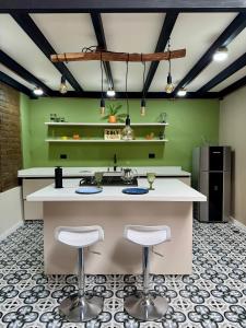 Η κουζίνα ή μικρή κουζίνα στο Casa de lujo con vista a Cristo Rey