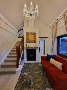 O zonă de relaxare la 1860 Heritage Beachside Studio