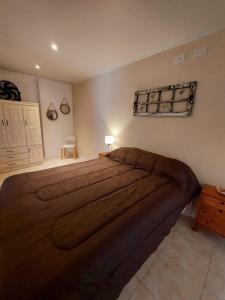 Ένα ή περισσότερα κρεβάτια σε δωμάτιο στο Sol de Monte