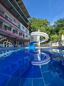 Bazén v ubytování Hotel Orquidea Dorada R nebo v jeho okolí