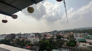a view of a city with buildings in the sky at Sky homestay in Dehradun +4 photos