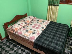 Postel nebo postele na pokoji v ubytování Holiday Guest in Nuwara Eliya