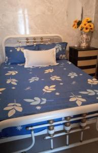 Postel nebo postele na pokoji v ubytování Acuarela del Rio H#2 Cerca Aeropuerto Habitación privada con baño