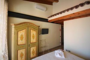 Postel nebo postele na pokoji v ubytování B&B I fiori di Marianna