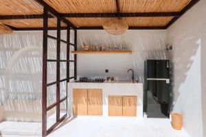 Η κουζίνα ή μικρή κουζίνα στο Villa Calipso