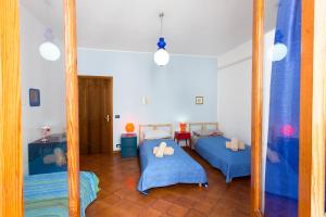 Postel nebo postele na pokoji v ubytování Casa Iolanda