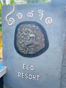 a sign for an eco resort with an elephant on it at Gimanhala Eco Resort in Vannativillu
