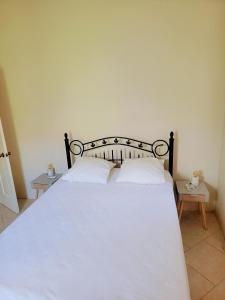 Postel nebo postele na pokoji v ubytování Hideaway House
