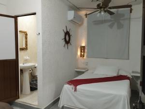 Postel nebo postele na pokoji v ubytování QUINTA DIAMANTE villas&hotel + 37 fotografií
