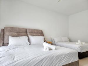 Postel nebo postele na pokoji v ubytování Rawang Home near Aeon 15 Pax WIFI Game Smart TV