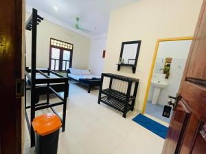 Voodi või voodid majutusasutuse Natraj Guest House toas