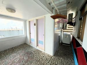 TV a/nebo společenská místnost v ubytování Lanyu Shell House